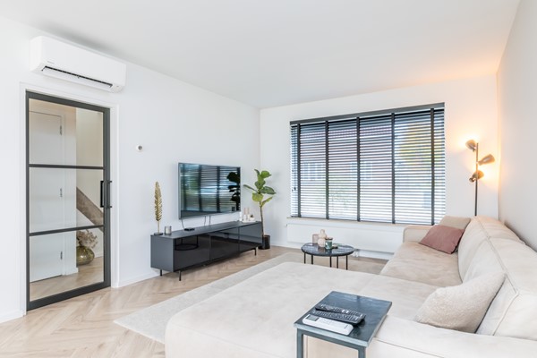 Foto - Verkocht onder voorbehoud: Instapklare gemoderniseerde geschakelde 2 onder 1 kap woning  met aanbouw, open keuken, tuin en garage in Voerendaal